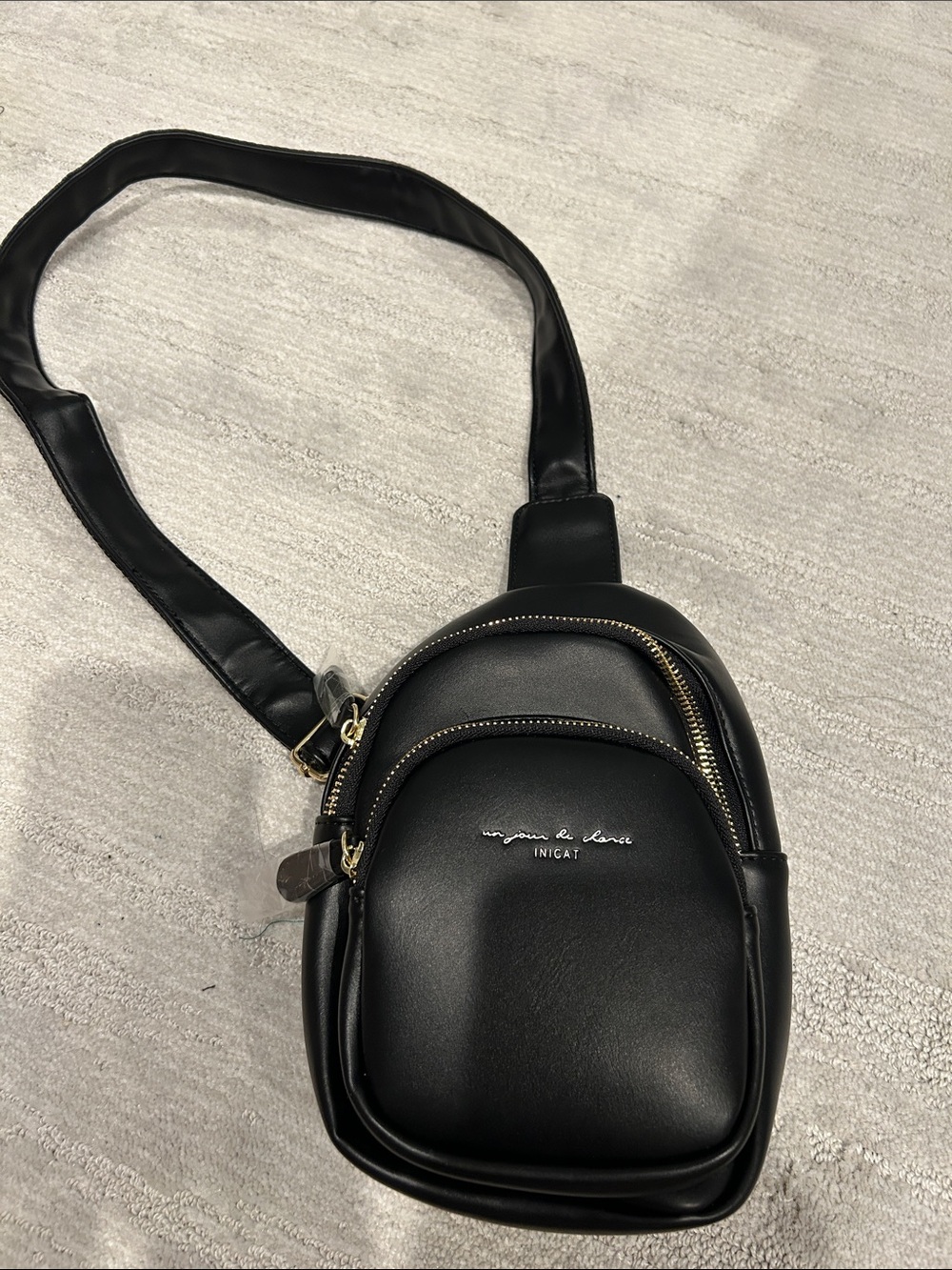 Nica Black Leather Sling Belt Bag with Gold Hardware